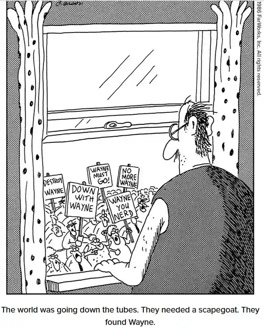 A man with glasses looks out a window at a crowd of angry people holding signs that read 'DESTROY WAYNE', 'DOWN WITH WAYNE'…