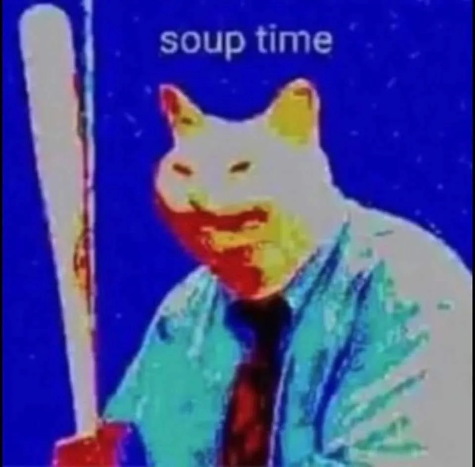 A heavily stylized, low-resolution image shows a cat with a human-like face wearing a collared shirt and tie, holding a…