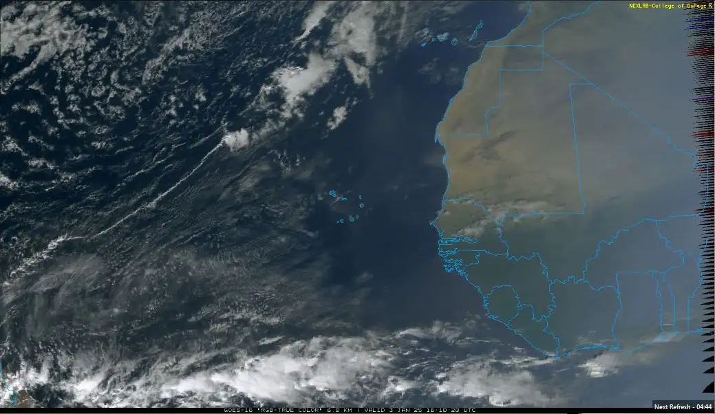A satellite weather image shows the western coast of Africa with cloud cover and ocean, overlaid with blue political…