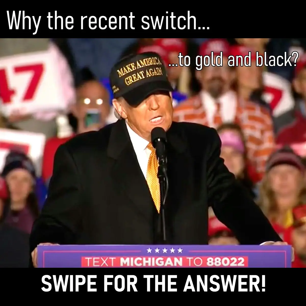 A man in a black suit and gold tie stands at a podium wearing a black 'MAKE AMERICA GREAT AGAIN' cap, with overlaid text…