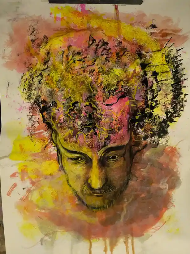 An abstract painting shows a man's face with a colorful, chaotic explosion of yellow, pink, and black paint above his head…